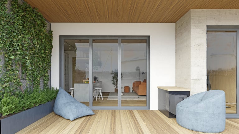 Puerta corrediza de vidrio moderno conectando espacio interior con terraza y naturaleza